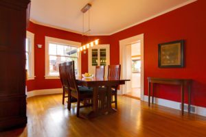 Classic red dining room with antique furniture at Grand Baie